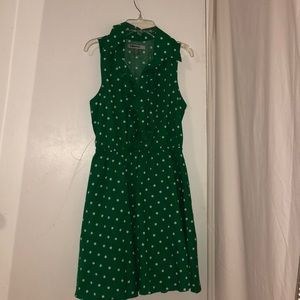 A green dress with pooka dots